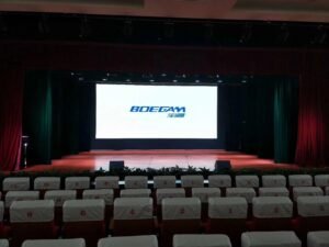 COMAC uses a wireless presentation device in a large conference hall for seamless screen sharing